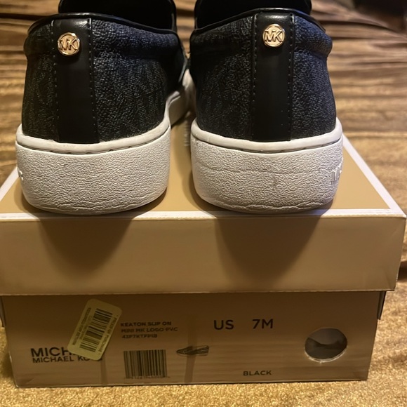 Michael Kors, black leather slip on shoe. Size 7. - Picture 2 of 4